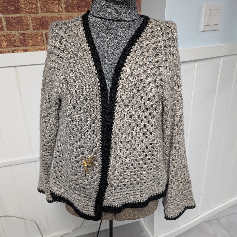 Granny Stitch Hexi Cardi, Neutral Tone Gray with Black Trim, Displayed with Pin
